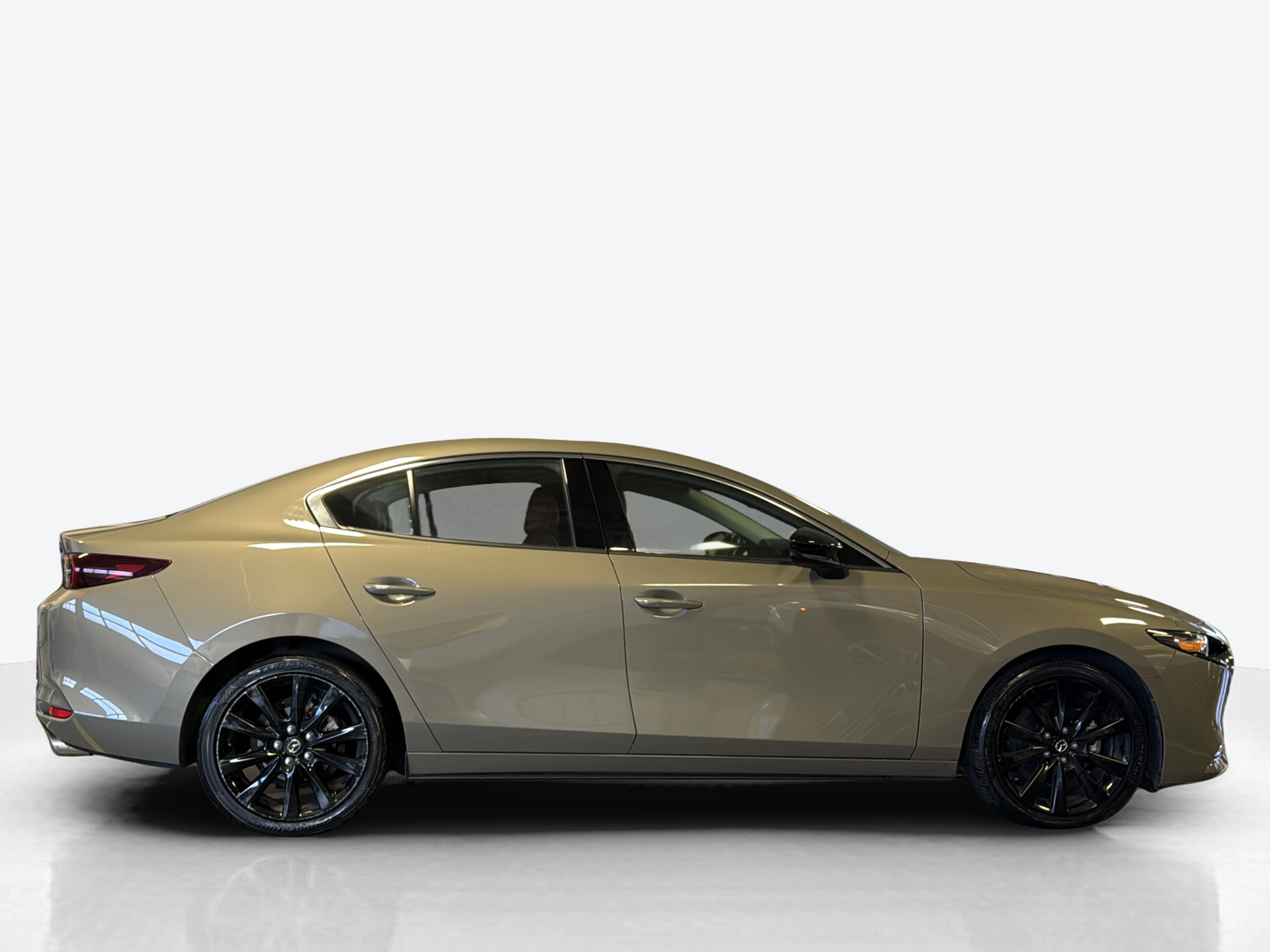 2024 Mazda Mazda3 Sedan | Starts at $459/mo | 38,299 mi | Beige